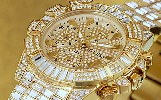 gold womens watch with crystals on bracelet and case