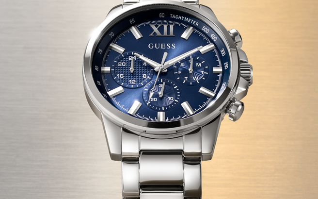 Silver watch with a blue dial on a gradient background