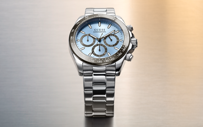 Silver watch with a blue face on a gradient background