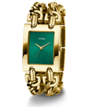Gold watch with green face and 'Guess' branding on a white background