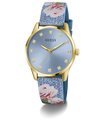 Guess watch with floral strap on a white background