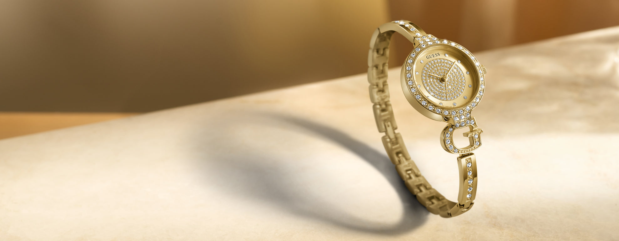 Womens Gold logo watch with crystals