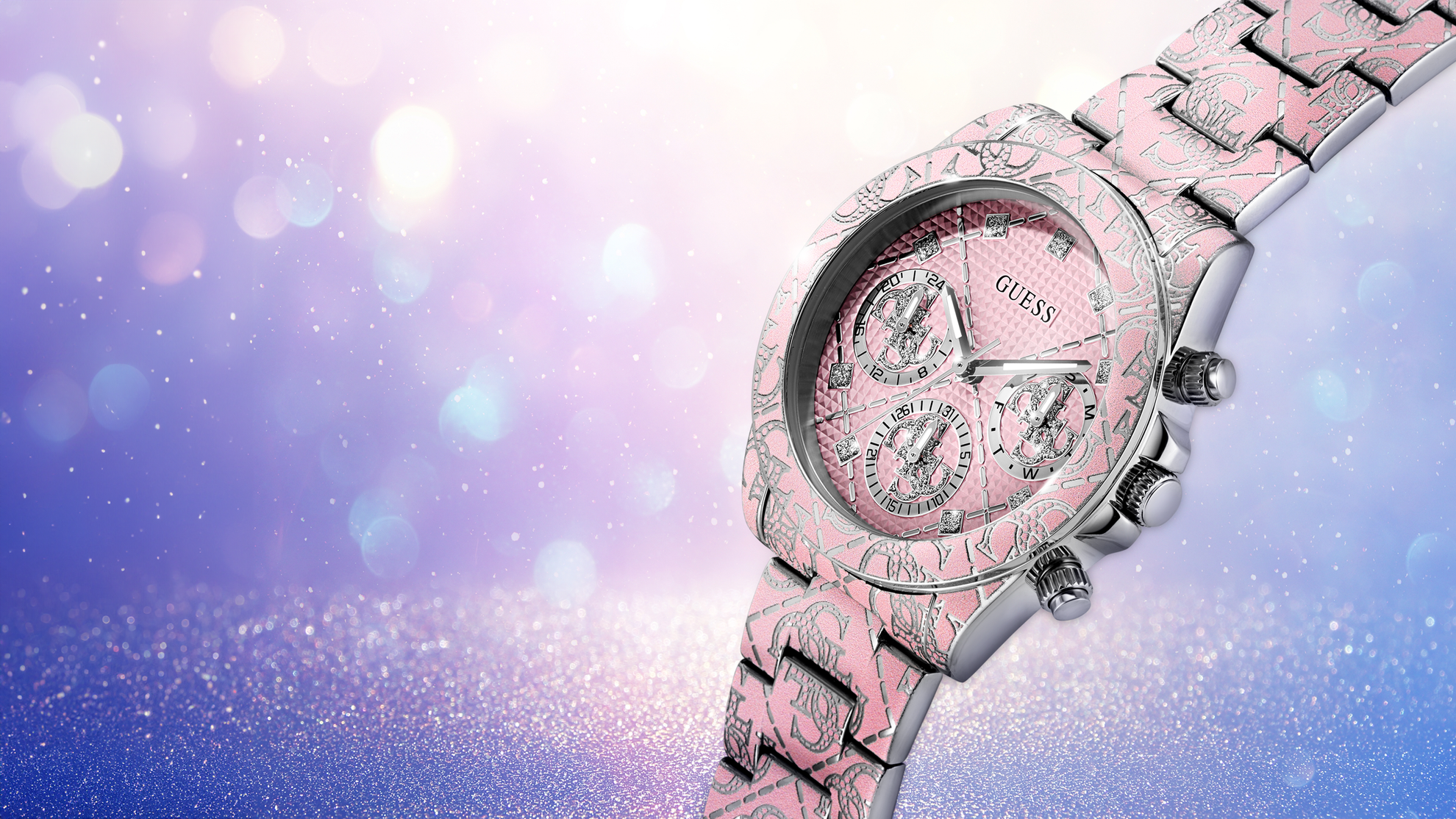 Pink Guess watch with a sparkling background
