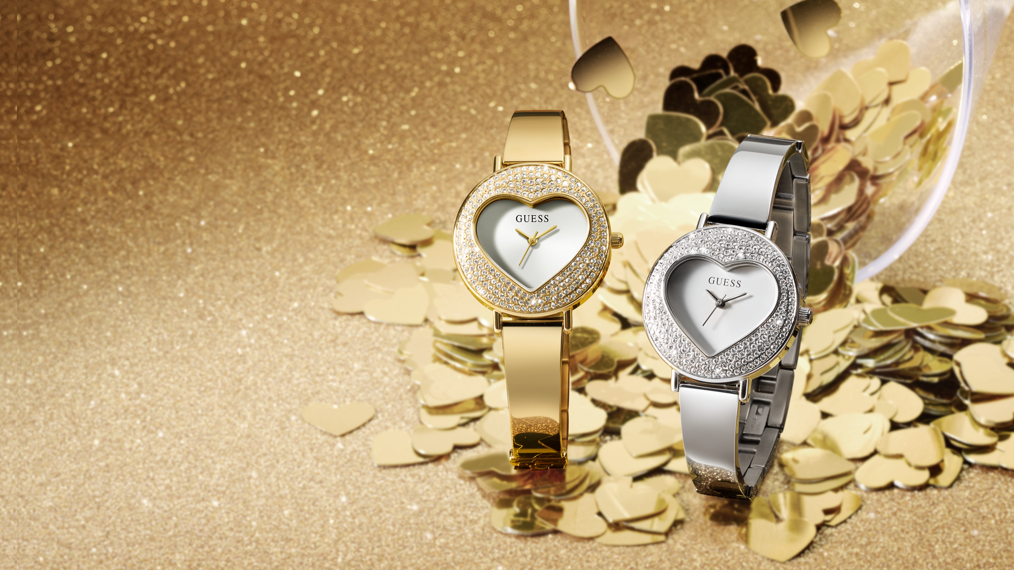 Two Womens silver and gold watches with heart shaped case