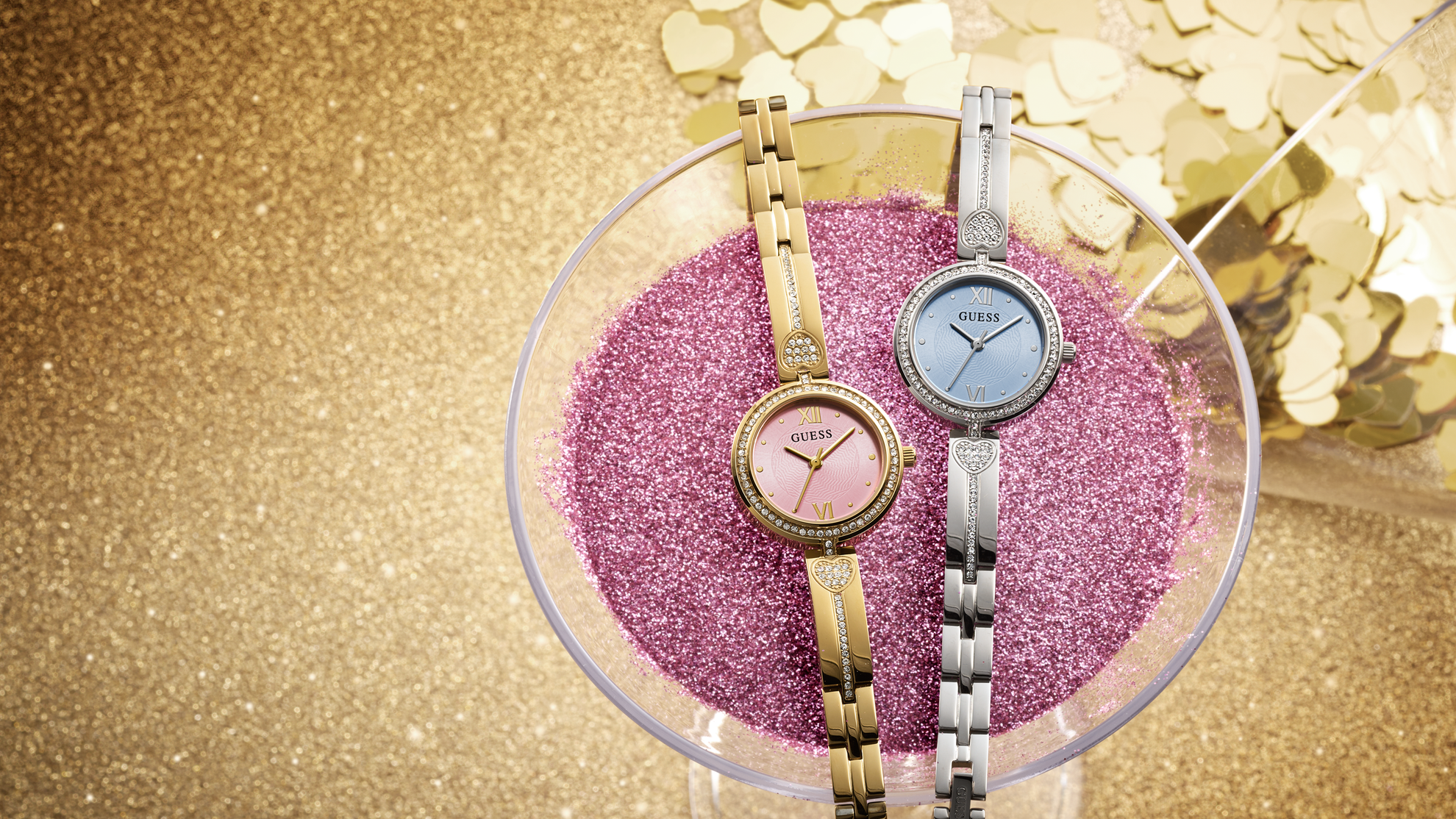 Two GUESS Watches in silver and gold with pink and blue dials