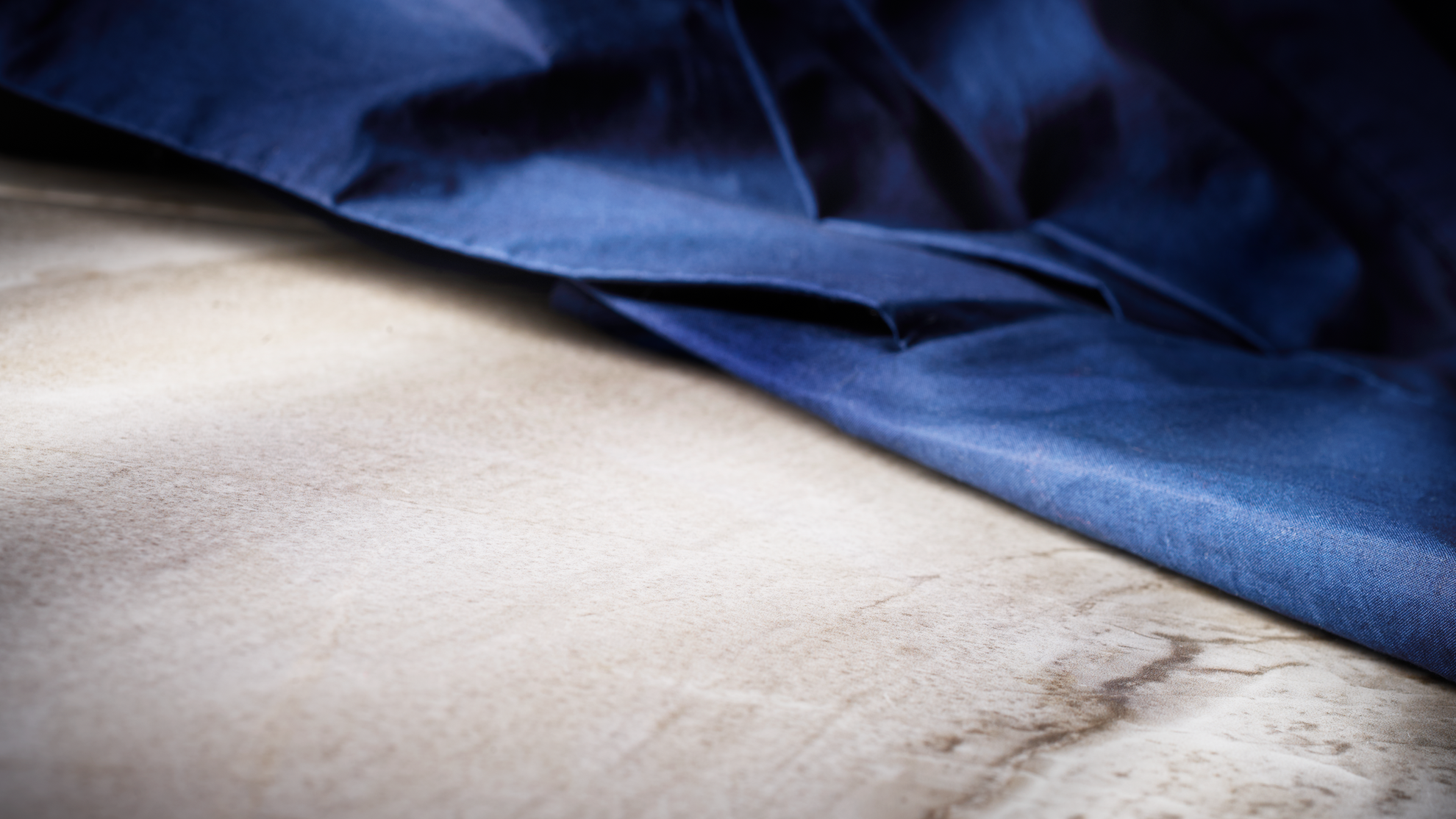 background with stone and dark blue material