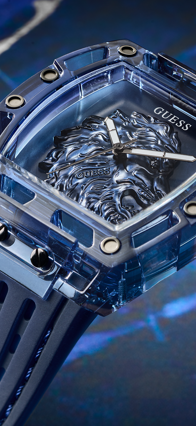 Close-up of a Guess watch with blue and silver design