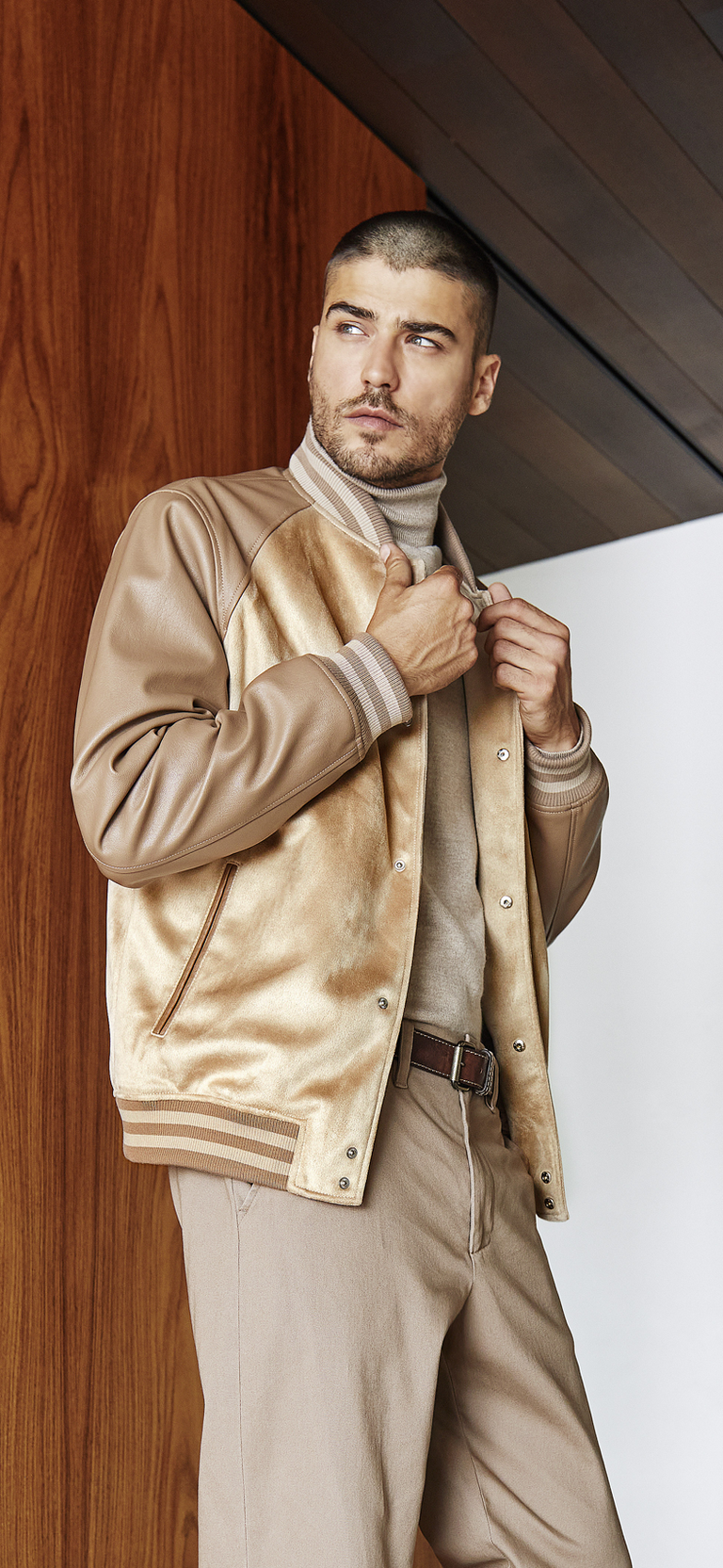 man in tan dress jacket