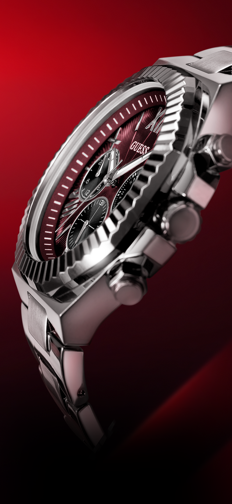 Angled view of a Silver watch with red face on a red background gw0703g7