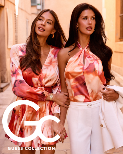 Two women in colorful outfits with Gc Guess Collection logo in the lower left