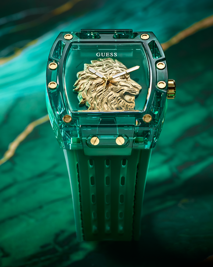 Green watch with gold lion emblem on a green background