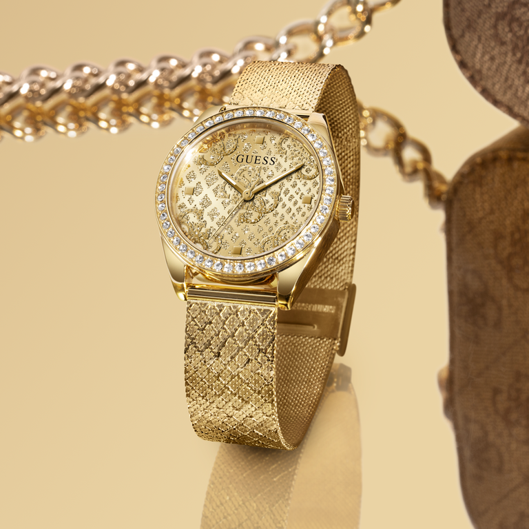 womens gold watch with mesh strap and gold logo pattern on dial