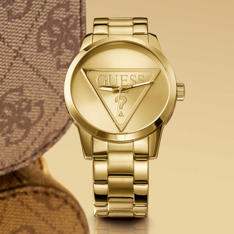 Gold mens watch with GUESS Logo on dial