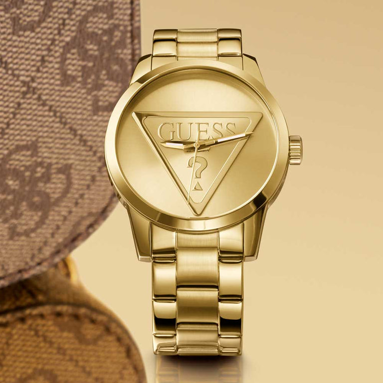 gold watch with logo on dial