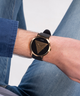 GUESS Mens Black Gold Tone Analog Watch lifestyle image