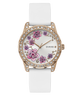 Guess watch with floral design and white strap on a white background