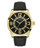 Black and gold watch with a black leather strap on a white background