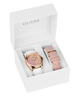 Guess watch set with two watches in a white box on a white background
