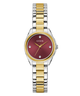 Two-tone watch with red face and gold accents on a white background