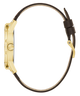 Gold-framed watch with black strap on a white background