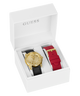 Guess watch set with gold face, black strap, and red strap in a white box