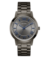 Guess watch with metallic band and blue hour markers on a white background