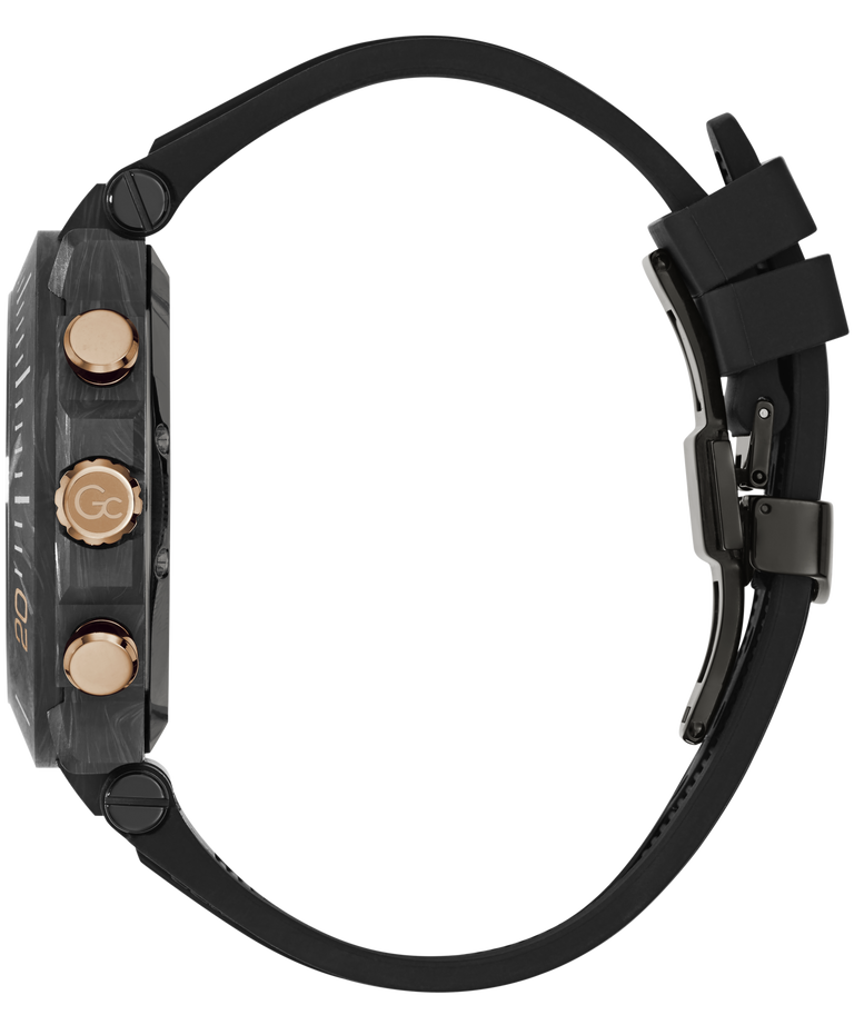 A close-up side view of a rugged smartwatch with a black textured case, three rose gold buttons, and a black silicone strap on a white background.