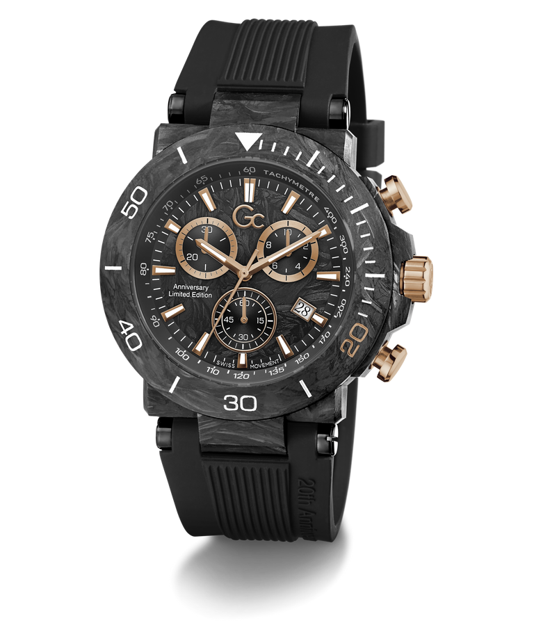 Gc One 20th Anniversary Limited Edition chronograph watch featuring a black carbon fiber bezel, a black dial with rose gold accents, and a black textured rubber strap, shown on a white background with a soft shadow.