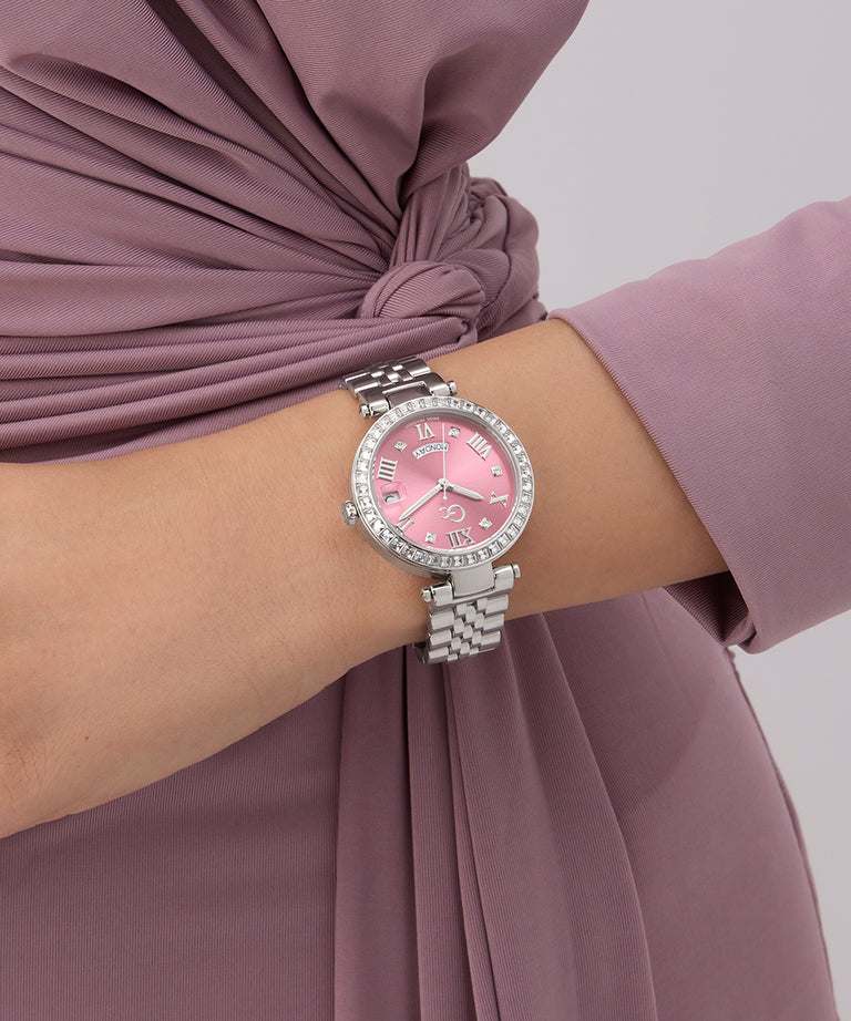 Z12010L9 Pink watch with silver bracelet on a wrist, wearing a mauve dress.
