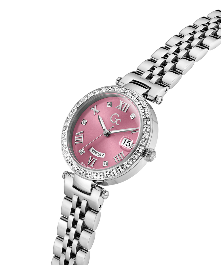 Silver watch with a pink face on a white background lifestyle