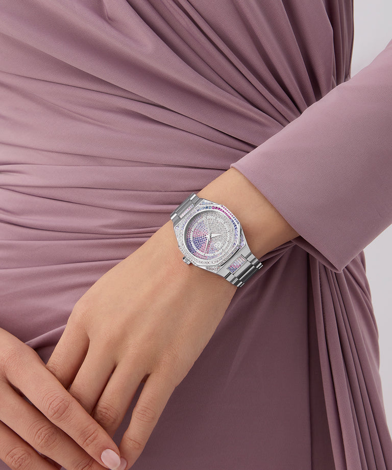 Gc Coussin Sleek Lady Mid Size Metal Silver watch on a wrist with a person wearing a mauve dress.