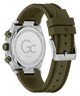 The back view of a GC brand watch with an olive green silicone strap and a silver stainless steel case, showing the engraved details on the case back and buckle.
