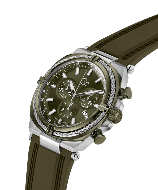 A chronograph watch with an olive green dial and matching olive green strap, featuring a silver-tone case with a distinctive braided bezel detail. lifestyle