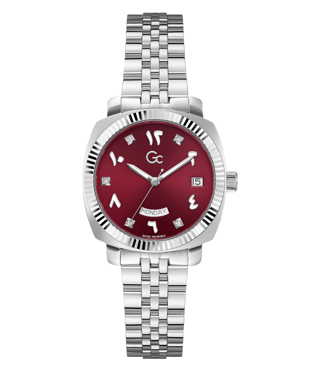 A wristwatch with a silver stainless steel link bracelet, a silver-tone case, and a deep red dial featuring Arabic numerals and a day/date window.