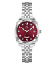 A wristwatch with a silver stainless steel link bracelet, a silver-tone case, and a deep red dial featuring Arabic numerals and a day/date window.
