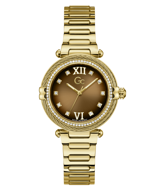 Gold Gc Vogue Cable Mid Size Metal watch with a brown dial featuring Roman numerals on a white background