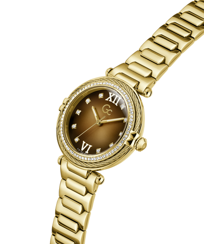 Gold Gc Vogue Cable Mid Size Metal watch with a brown dial on a white background lifestyle