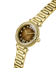 Gold Gc Vogue Cable Mid Size Metal watch with a brown dial on a white background lifestyle