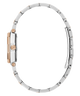 Side  of a silver and rose gold watch band on a white background