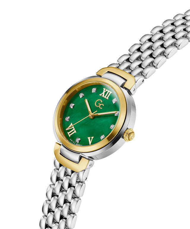 Gc Allure Mid Size Metal Watch with green face and silver and gold band on white background lifestyle