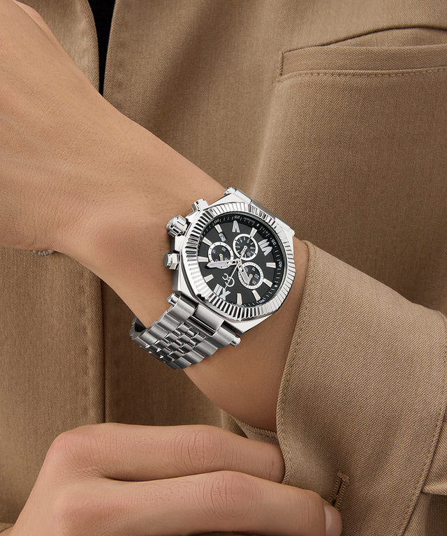 Gc Atlas Chrono Metal Silver watch on a wrist with a brown background