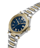 Two-tone watch with gold and silver band on a white background lifestyle