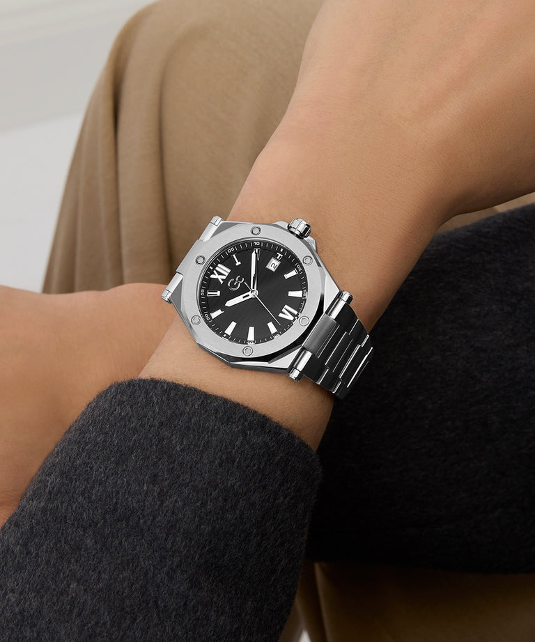 Gc Legacy Sleek Metal watch on a wrist with a neutral background