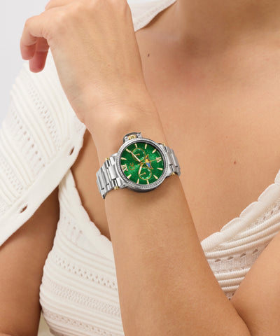 Green Gc MoonChic Large Size Metal with silver case on a person's wrist against a white background