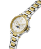 Two-tone watch with gold and silver band on a white background lifestyle