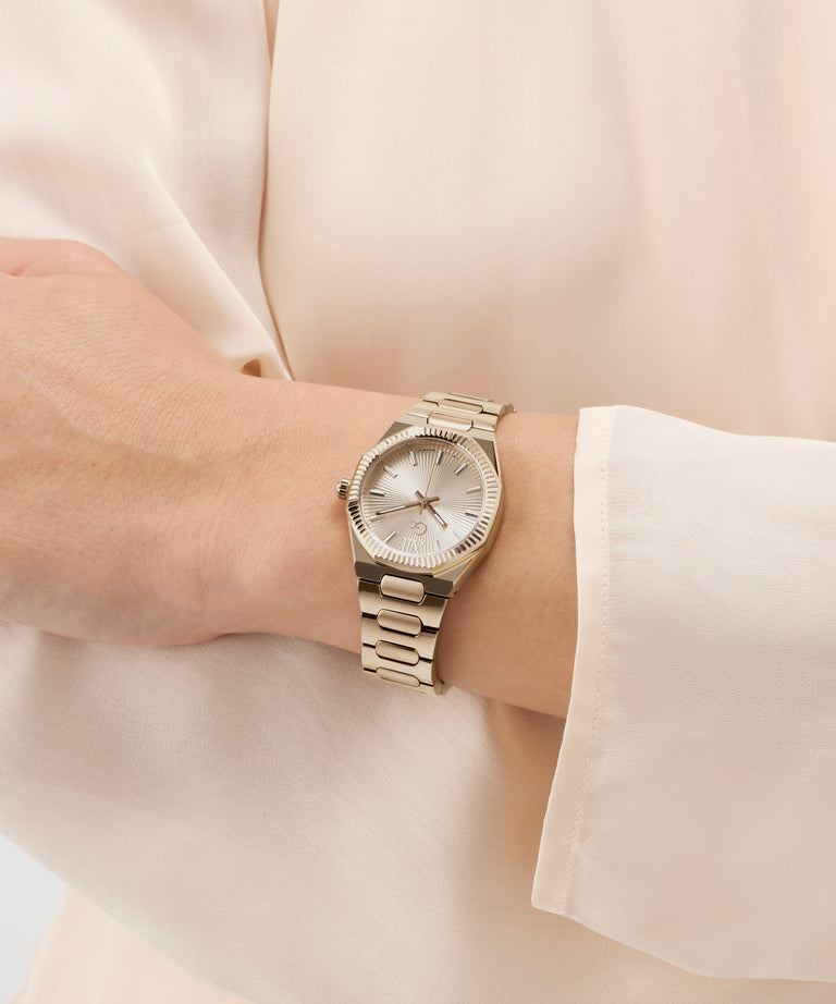 Gc Prodigy Lady Mini Small Size Metal watch on a wrist with a light background