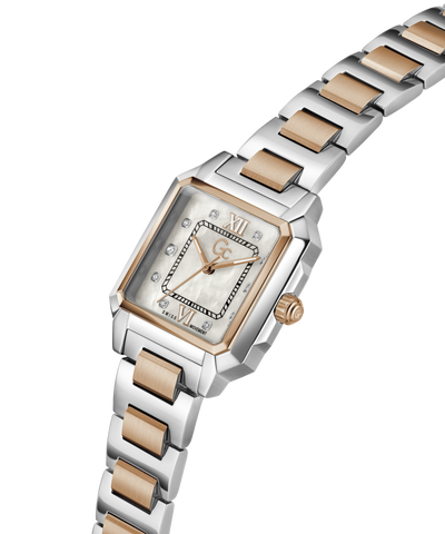 Two-tone watch with silver and rose gold band on a white background lifestyle