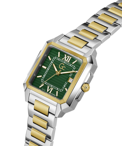 Two-tone silver and gold watch with a green face on a white background lifestyle