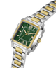 Two-tone silver and gold watch with a green face on a white background lifestyle
