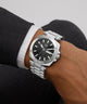 Silver Gc Nobilis Metal on a wrist with a plain background